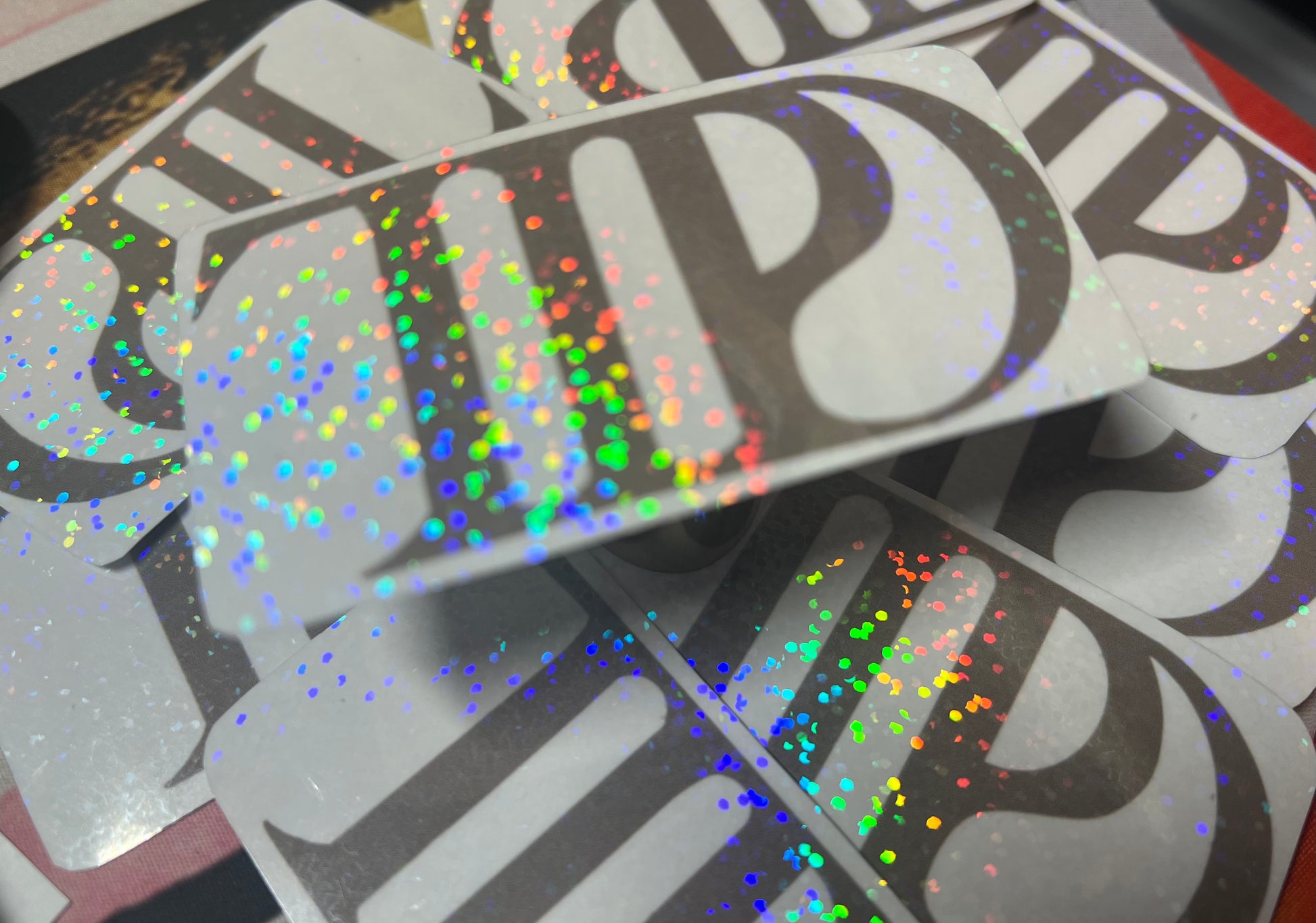 One 3x1 holographic laminated sticker 